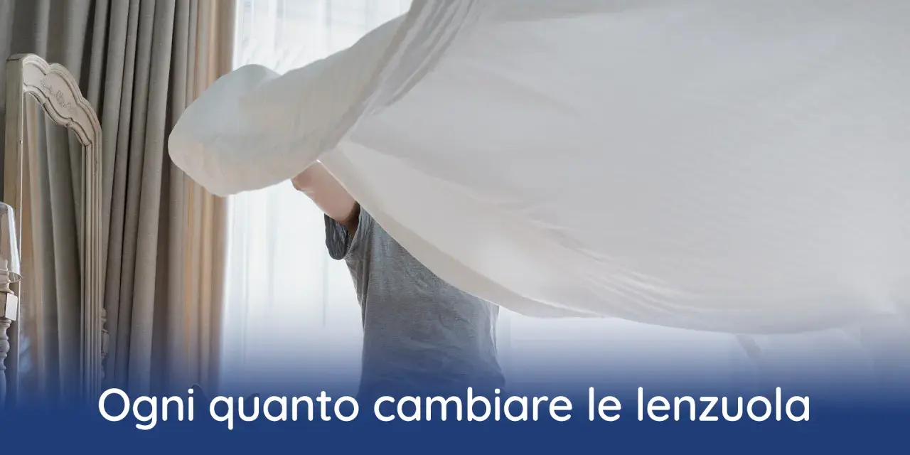 Persona che cambia le lenzuola, un gesto di cura per sapere ogni quanto cambiare le lenzuola e mantenere un ambiente fresco e pulito.