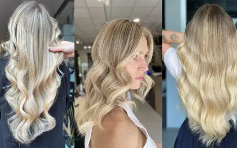 Capelli lunghi e ondulati con sfumature biondo platino, un look radioso e luminoso.