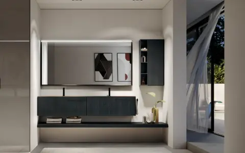 Elegante bagno moderno con mobile sospeso scuro, specchio illuminato e vista su un giardino esterno.