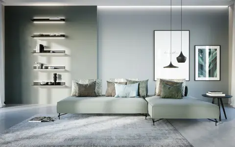 Soggiorno di una casa moderna con divano angolare, quadri e mensole illuminate.
