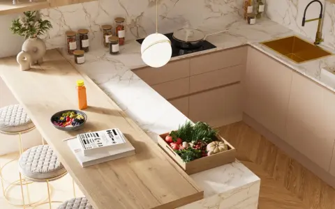Top cucina laminato: pro e contro. Un piano di lavoro in laminato effetto legno, con ciotola di frutta, libri e sgabelli, in una cucina moderna.