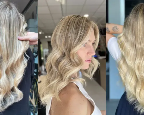 Capelli lunghi e ondulati con sfumature biondo platino, un look radioso e luminoso.