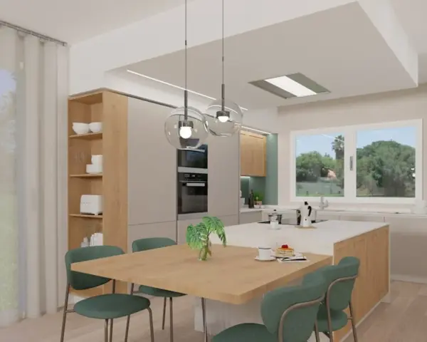 Cucina moderna con isola centrale, tavola in legno e sedie verdi. L'abbinamento colori arredamento crea un ambiente accogliente e luminoso.