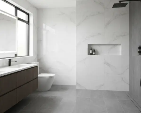 Bagno moderno con doppio lavabo, specchio illuminato, WC e doccia a filo pavimento. Ideale per capire come pulire la doccia e mantenere tutto splendente.