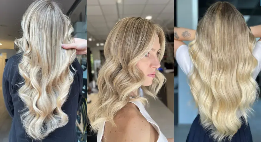 Capelli lunghi e ondulati con sfumature biondo platino, un look radioso e luminoso.
