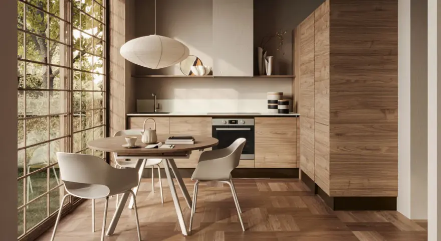 Cucina moderna con mobili in legno di noce e un tavolo rotondo, perfetta per arredare la cucina in modo originale.