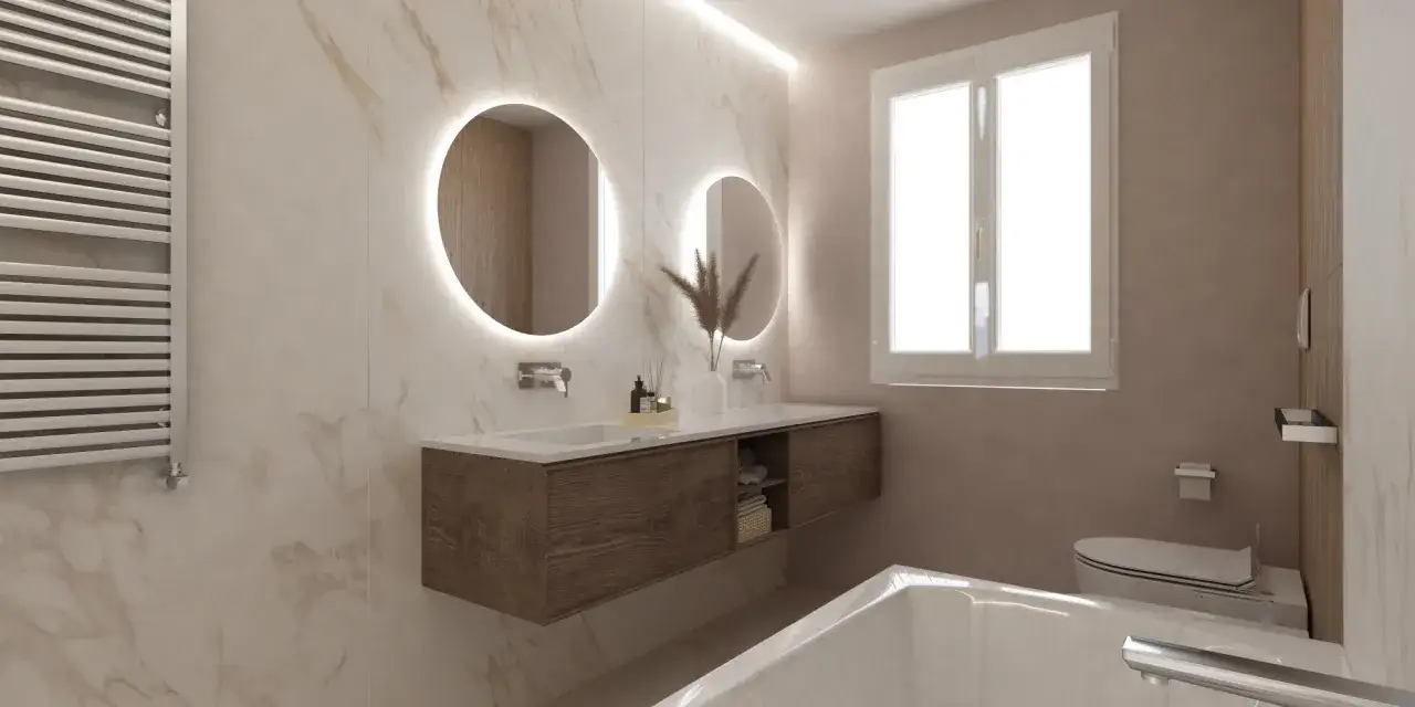 Bagno elegante e raffinato con doppio lavabo, specchi rotondi retroilluminati, finiture in marmo e legno scuro.