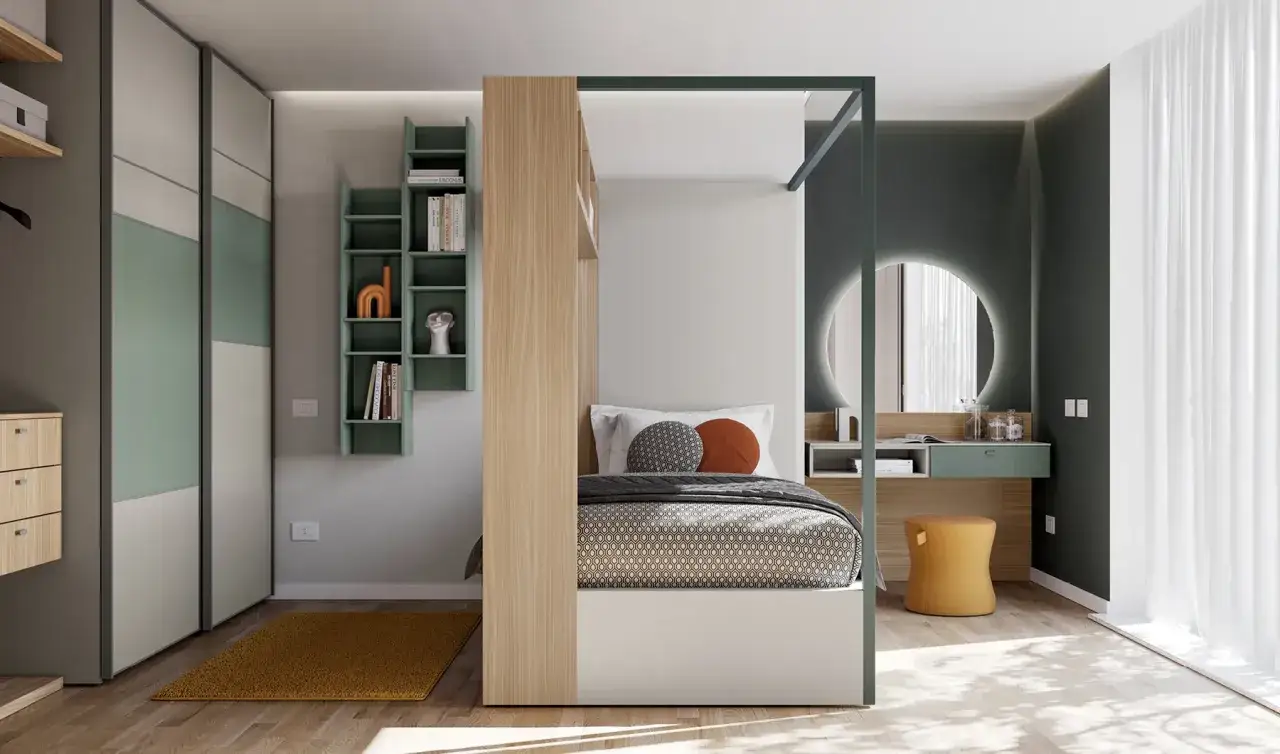 Un moderno angolo trucco in camera da letto, con specchio rotondo illuminato e un pouf giallo ocra.