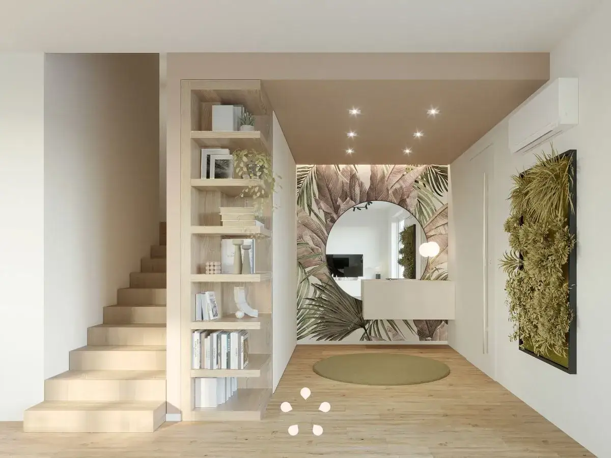 Ingresso moderno con libreria a giorno, carta da parati tropicale, specchio rotondo e verde verticale. Ottime idee ingresso casa.