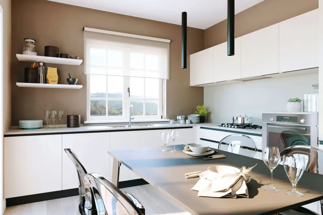 Cucina moderna con idee cucine ad angolo ben integrate, mobili bianchi, tavolo con sedie trasparenti e vista panoramica.